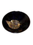 Traditional Chinese bowl with golden leaf inside